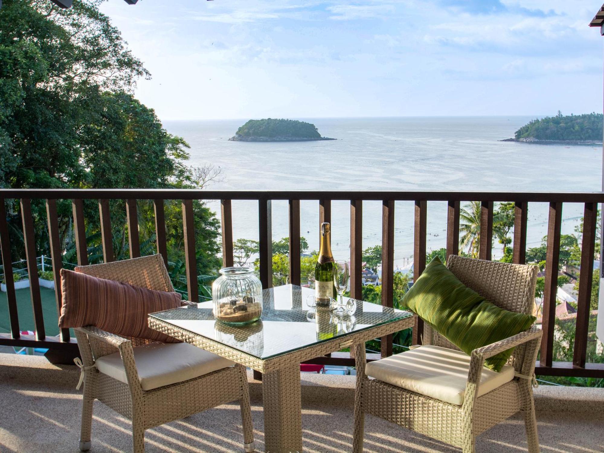 Andaman Cannacia Resort & Spa - Sha Extra Plus Kata-part Kültér fotó A balcony with a view of the ocean