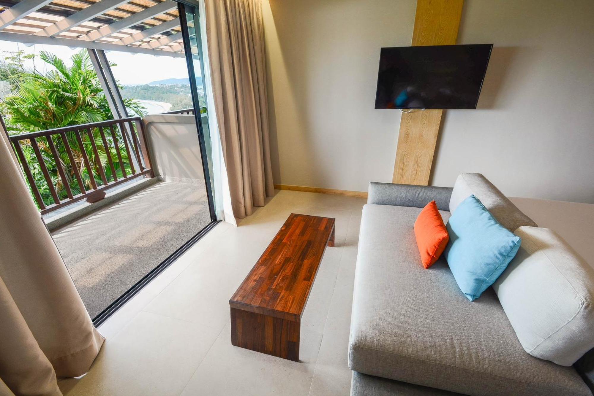 Andaman Cannacia Resort & Spa - Sha Extra Plus Kata-part Kültér fotó A living room at the resort